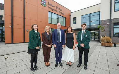Education Minister Paul Givan pictured at New-Bridge Integrated College with Principal Hilary Harbinson, previous Principal Anne Anderson and head girl and head boy.   