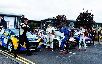 Osian Pryce and James Morgan celebrate their Down Rally win. Photograph: Aynsley Johnston Photography