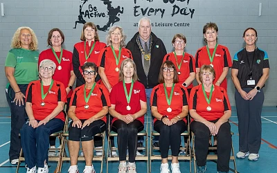 Banbridge Walking Netball Team, The Bann Ballers, who were crowned overall winners of the recent Down Leisure Centre tournament with Newry, Mourne and Down District Council Chairperson Councillor Glyn Hanna. Included are Betty Wilson (back left), Netball NI ‘Here If You Need’ coach and the Council’s Sports Development Officer Paula Early (back right).
