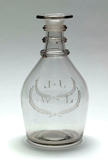 An early 19th century wedding decanter made in Newry, engraved with the initials WL and JL. Newry and Mourne Museum Collection